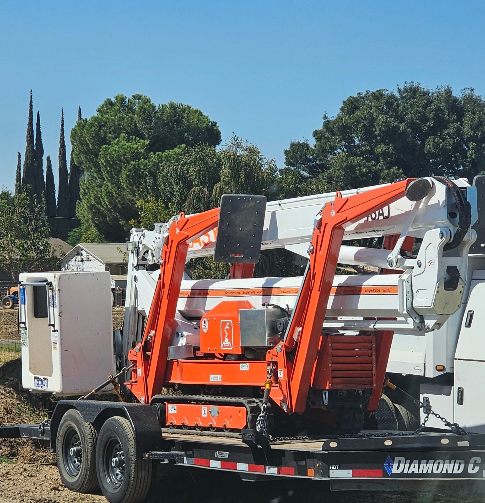 A diamond trailer with a crane on it