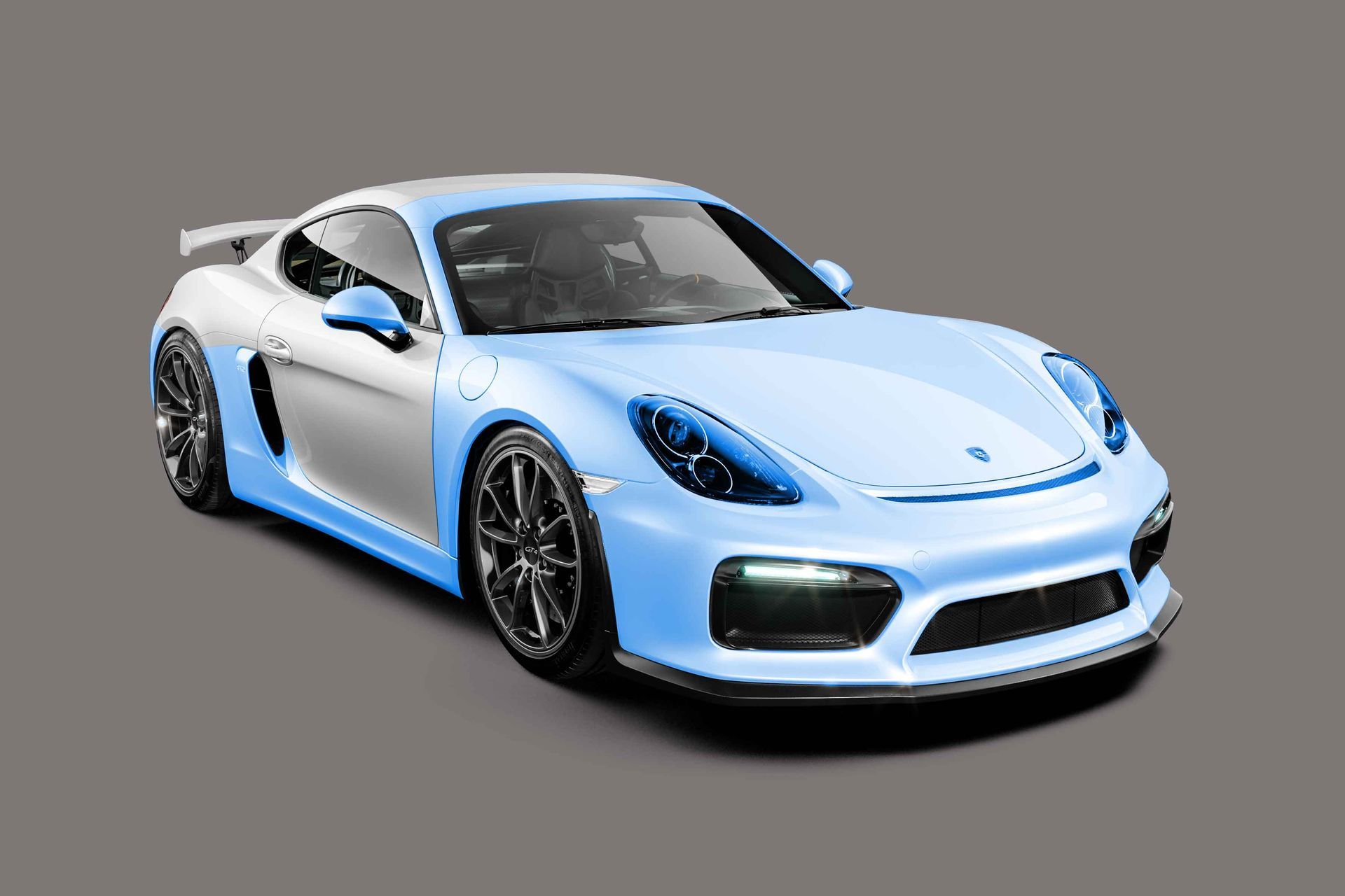A blue and white sports car on a gray background.