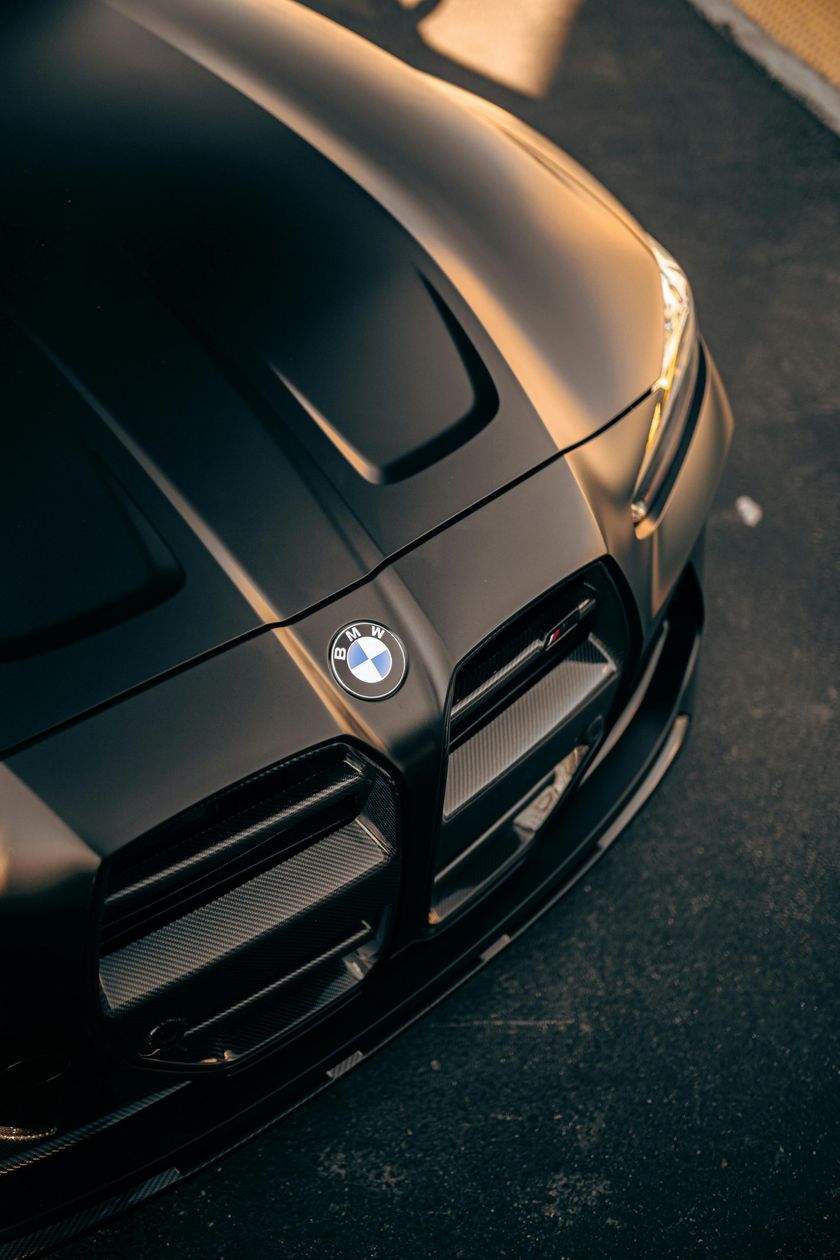 A close up of the front of a bmw car