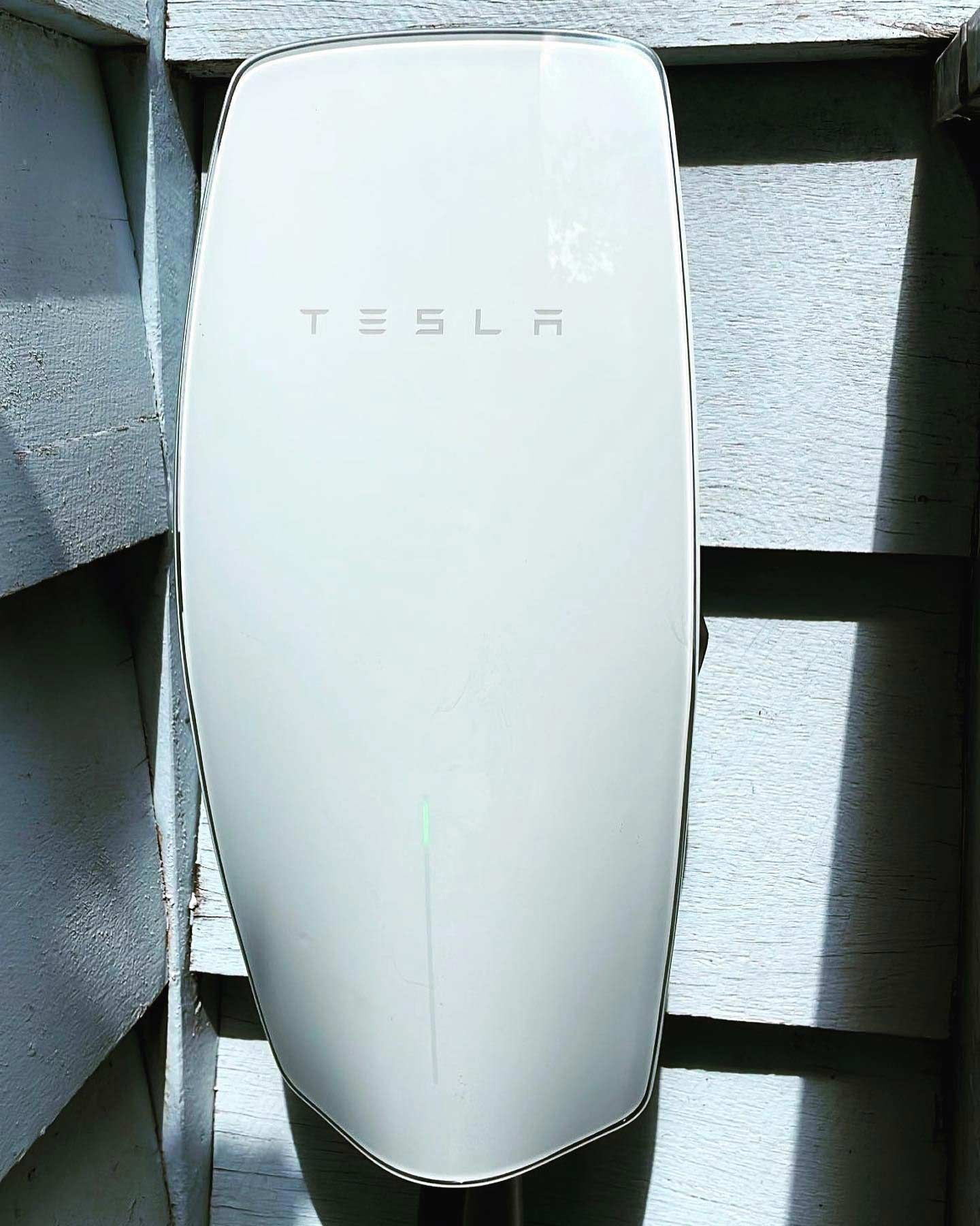 White Tesla Wall — TB Electrical & Communications in Erina, NSW
