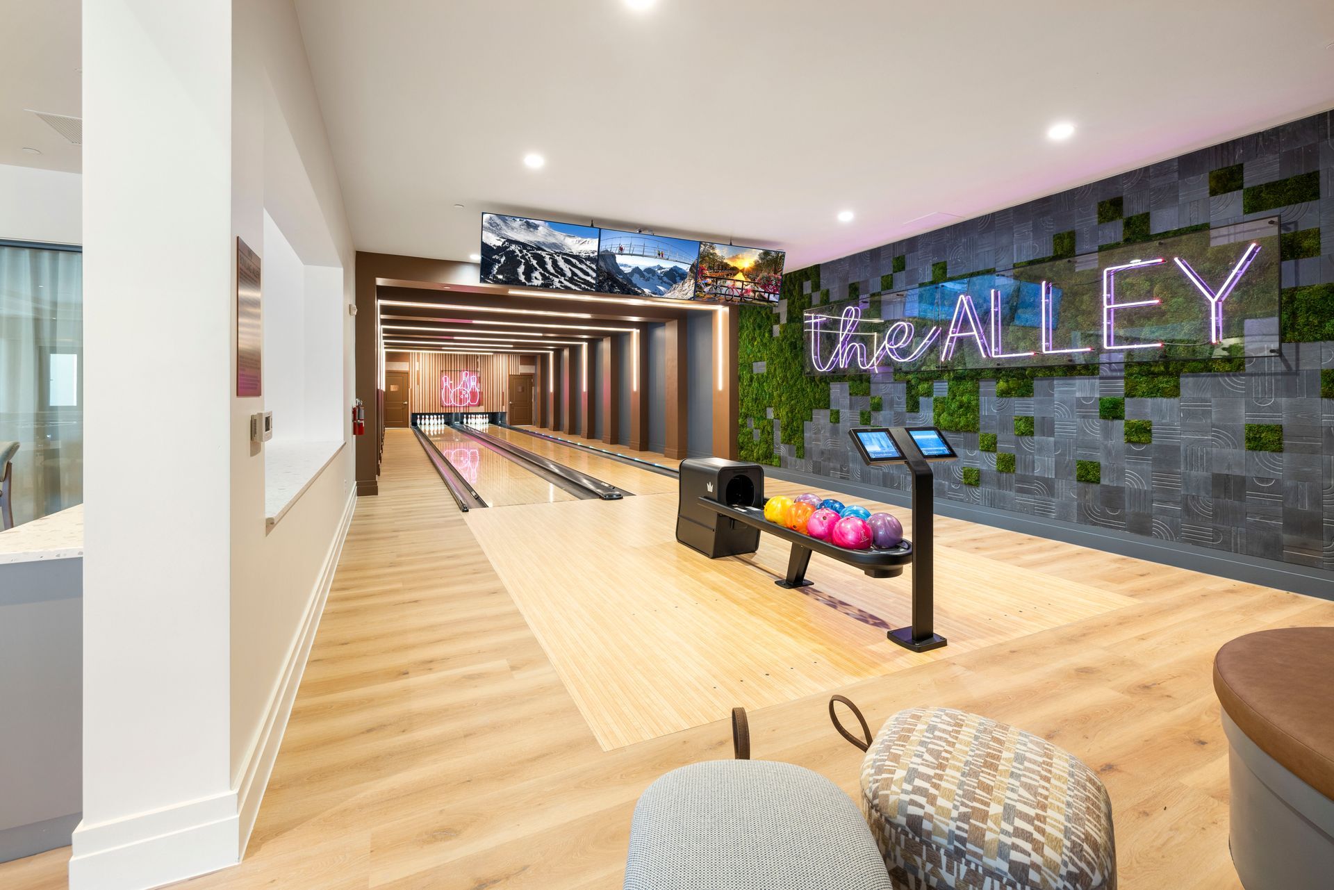 There is a bowling alley in the middle of a hallway at Corsa at Estero Crossing.