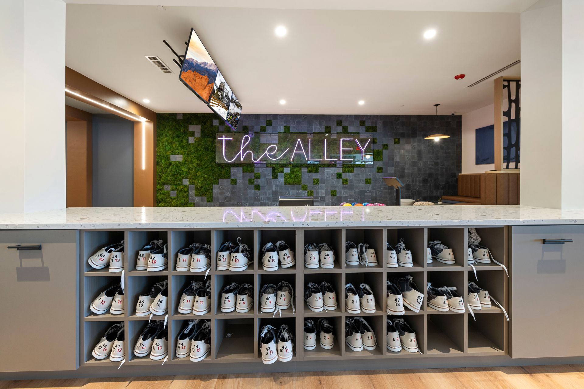 A room with a sign that says the alley on it at Corsa at Estero Crossing.