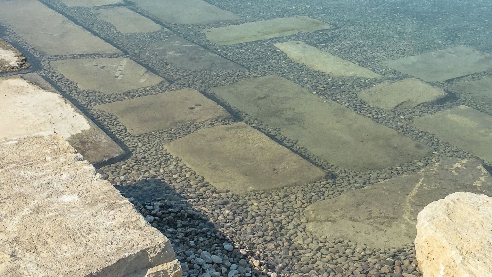 Gartenbau und Gartengestaltung Lehmteich Muschelkalk Blockstufen