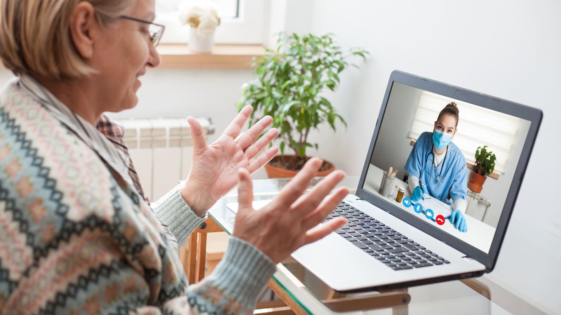 An older woman taking a telemedicine appointment.