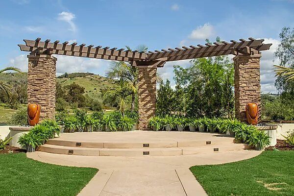 A stone archway with steps leading up to it