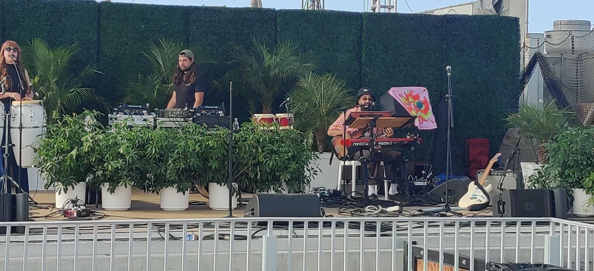A group of people are playing instruments on a stage.