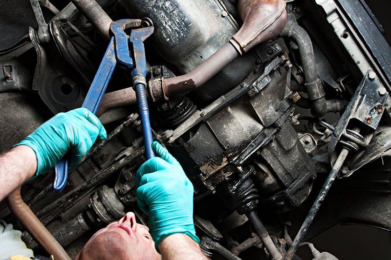 Mechanical Repairs A Car In The Garage — Woolcock Automotive In  Townsville QLD
