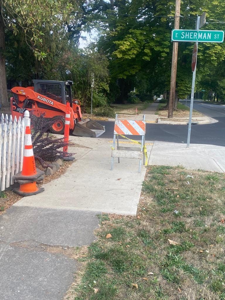 A construction site with a sign that says sherwood st.