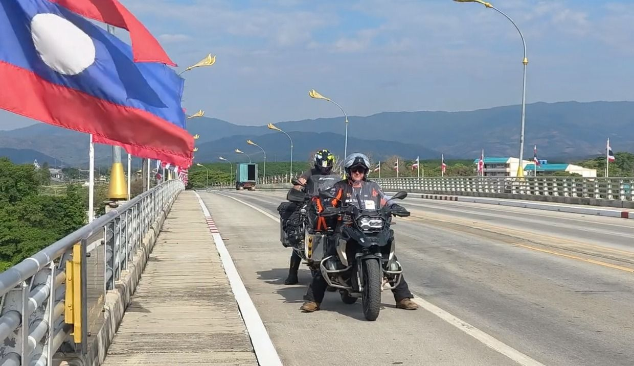 riders riding the motorbikes in Laos