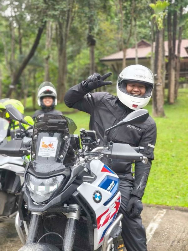 happy-motorcycle-rider-bike-tour-asia