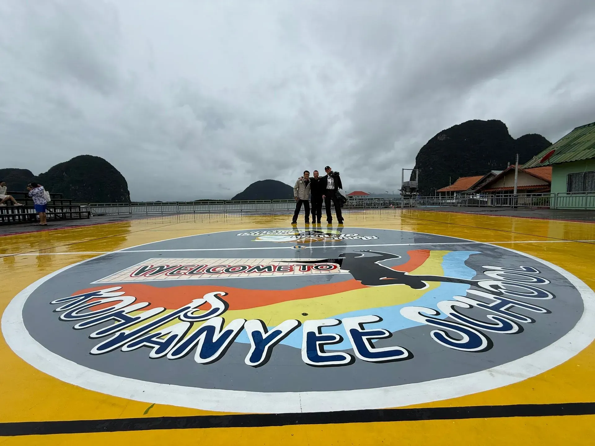 Bike Tour Asia riders visiting the floating village of Koh Panyee in Phang Nga Bay, Thailand