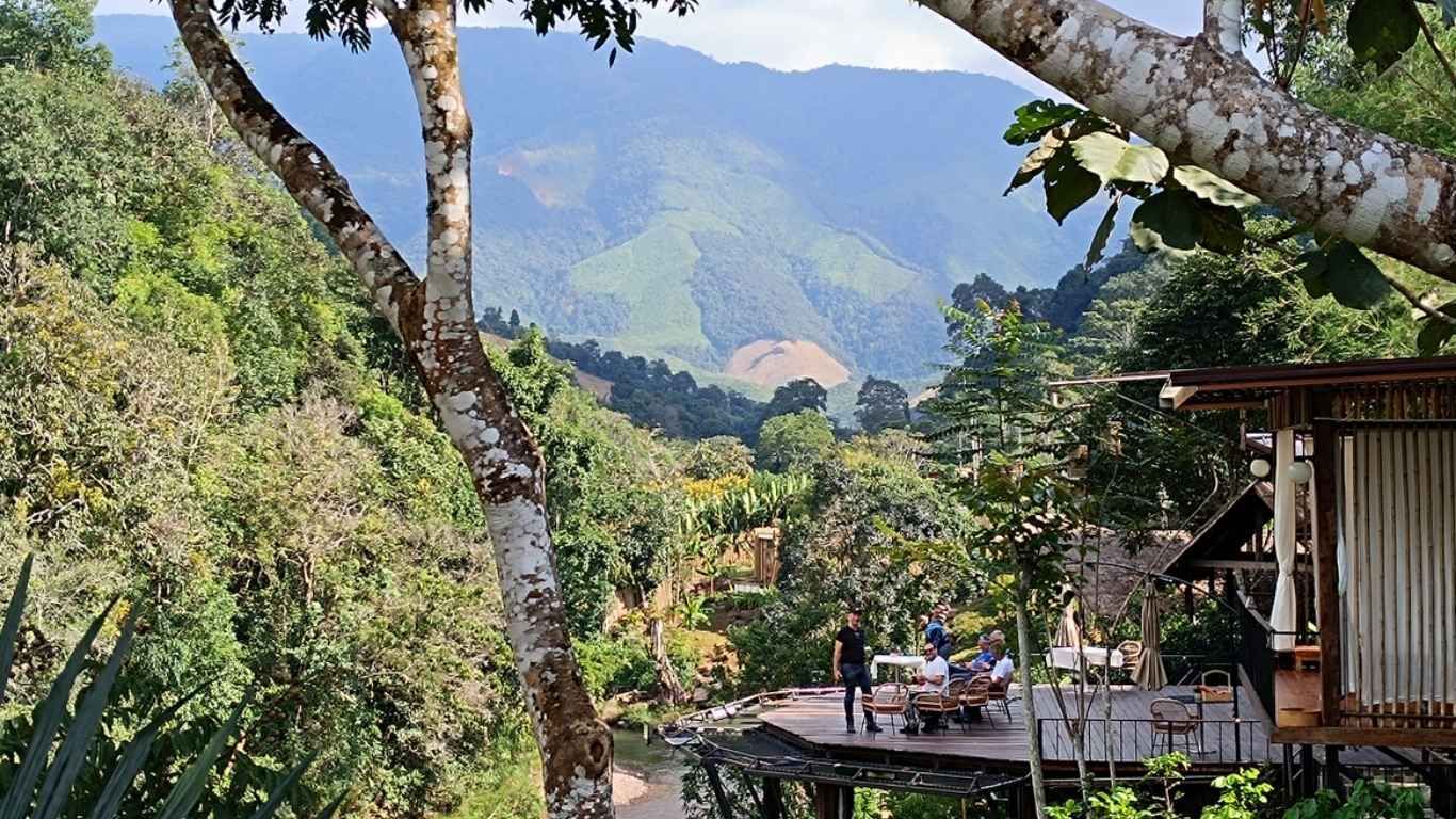 people from bike tour asia have fun at the cafe with the great view