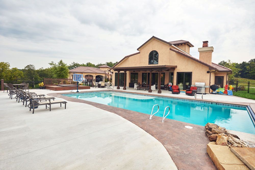 Pool & House in Mid-Missouri. Choose Design Built Homes for Residential Construction in Columbia, MO