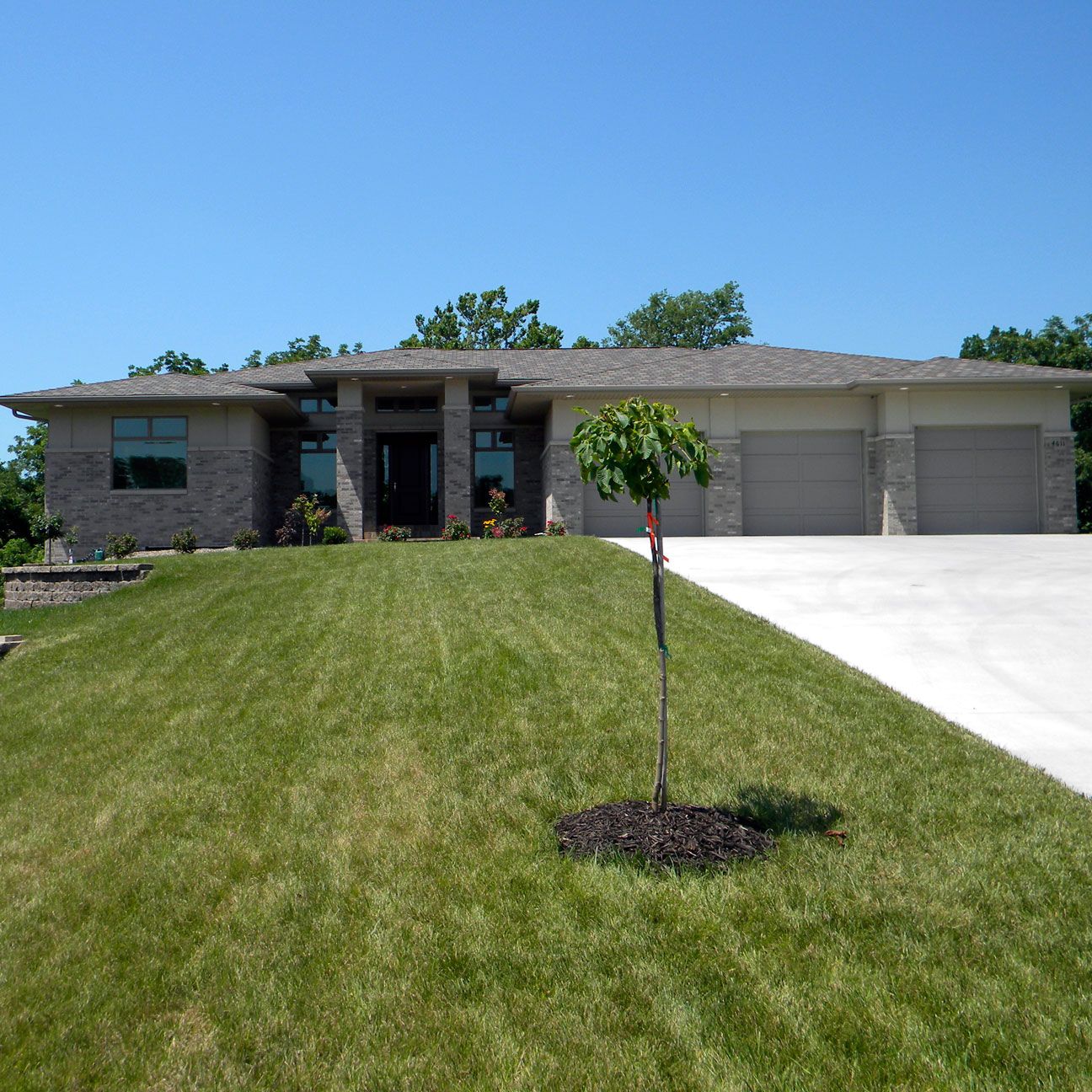 Build a Home With Plenty of Garage Space & Modern Style With Design Built Homes.