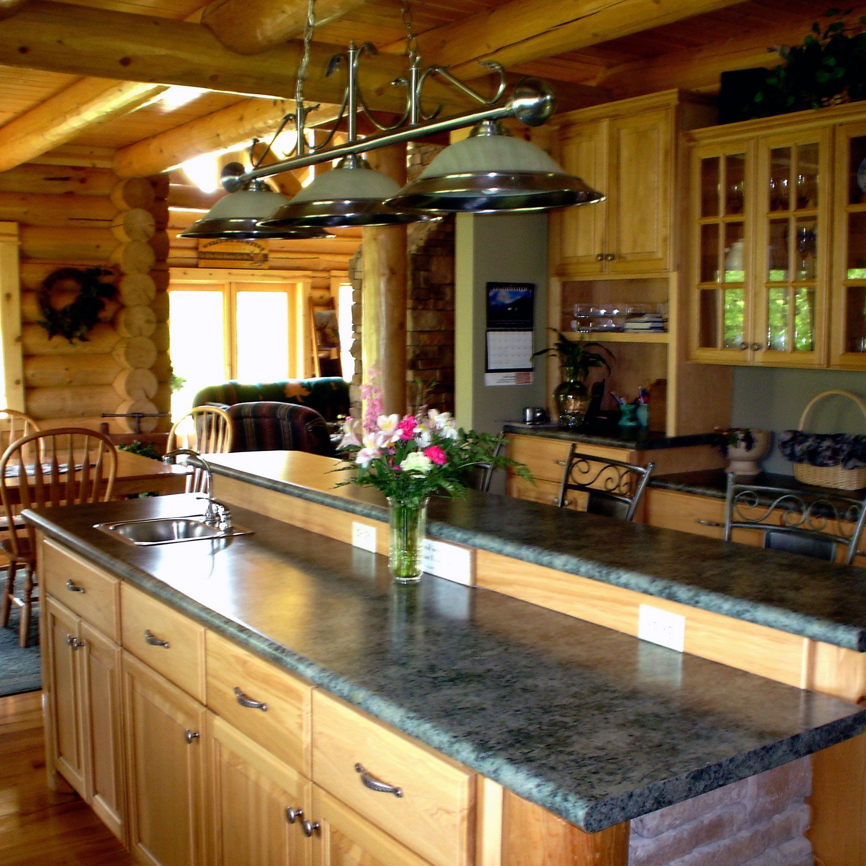 Build Your Log Home With a Beautiful Kitchen When You Call Design Built Homes in Mid-Missouri