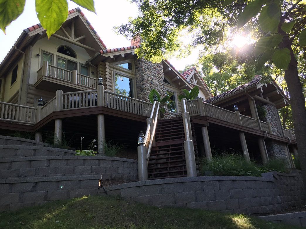 A Stunning Two-Story Log Home Designed & Constructed By Design Built Homes in Mid-Missouri.