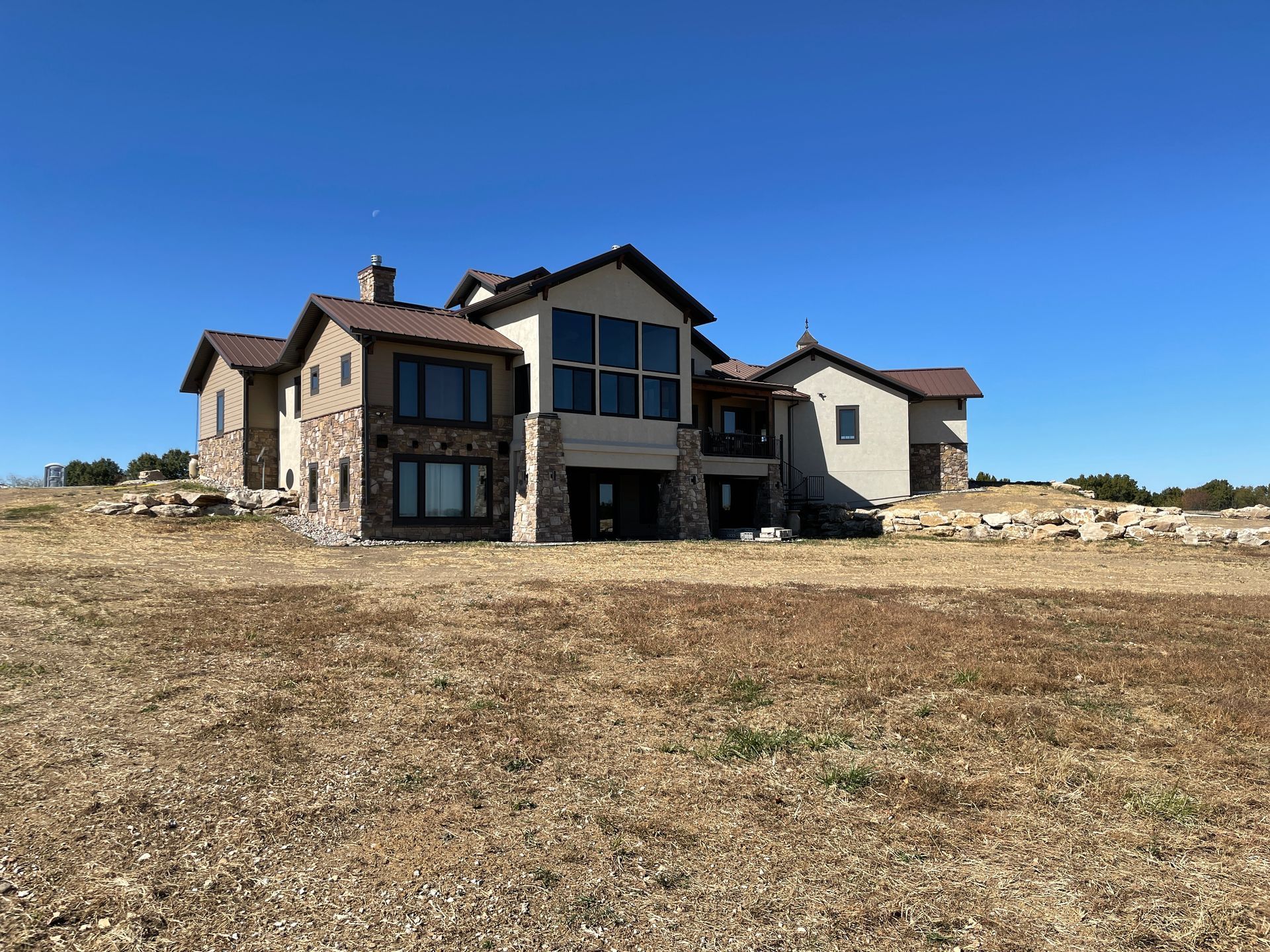 A Wide Shot View of a Large Custom Home Built By Design Built Homes in Mid-Missouri.