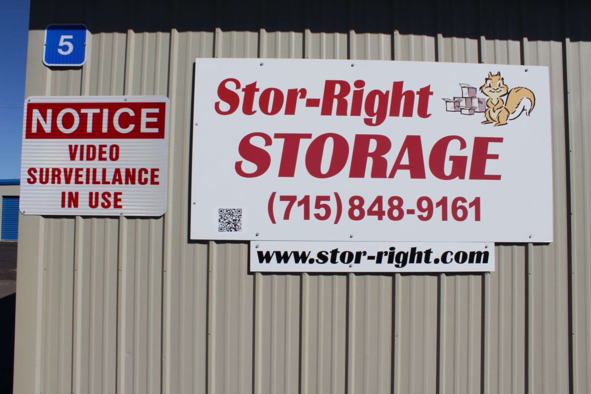 A sign for stor-right storage says video surveillance in use