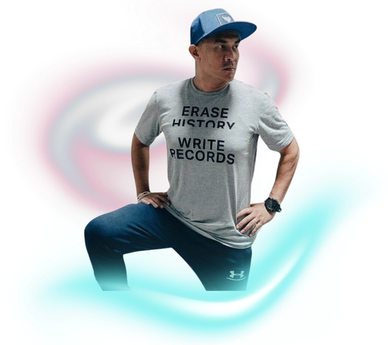 A person wearing a blue cap and grey t-shirt with 