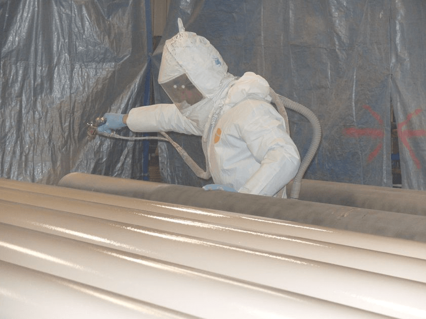 Man In Safety Suit | Cheyenne, WY | Cahoy Pump Service