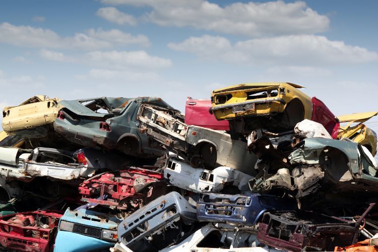 piled up junk cars