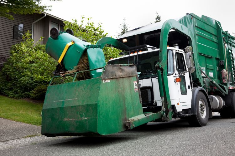 professional yard waste pickup service truck