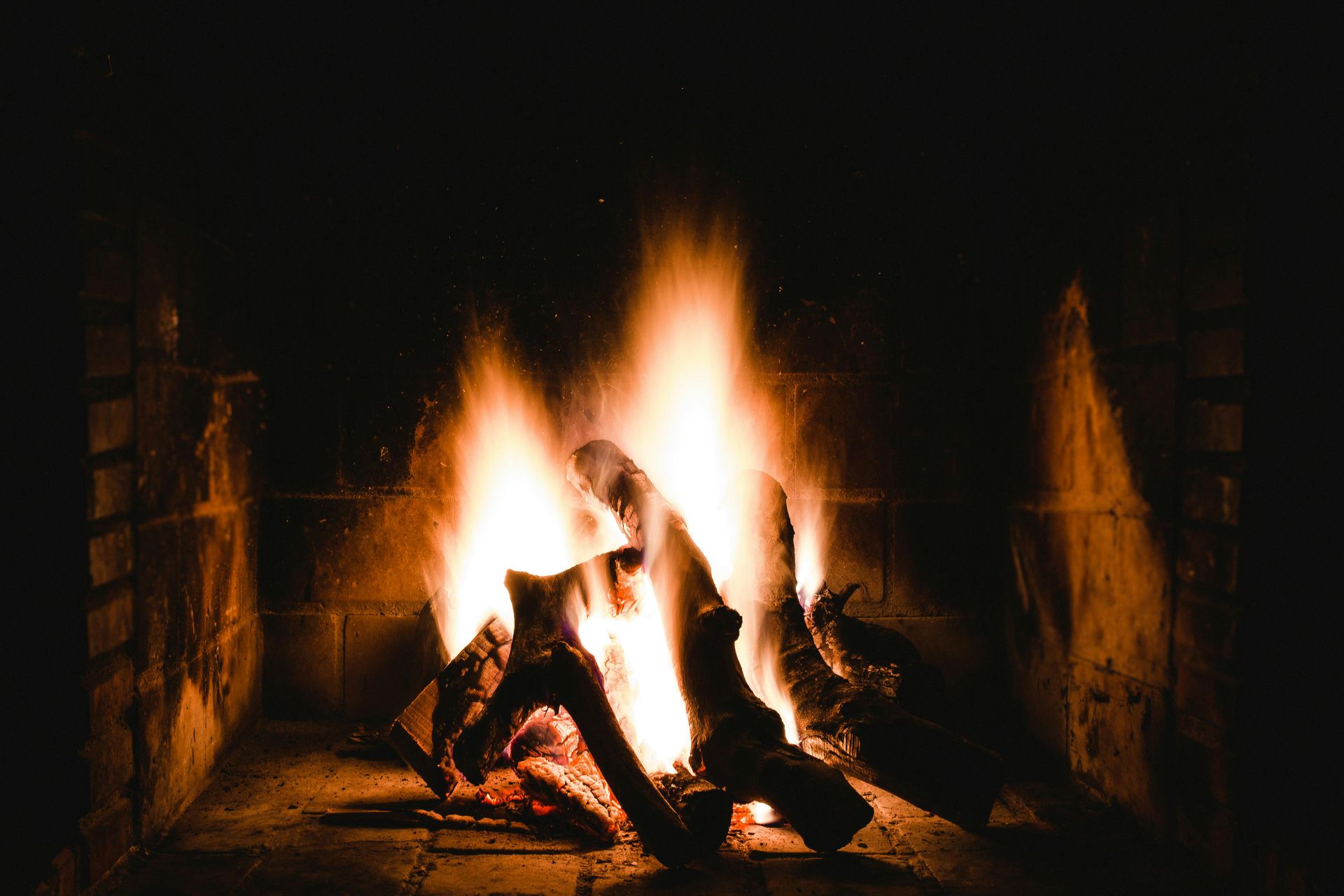 Firewood burning in a fireplace