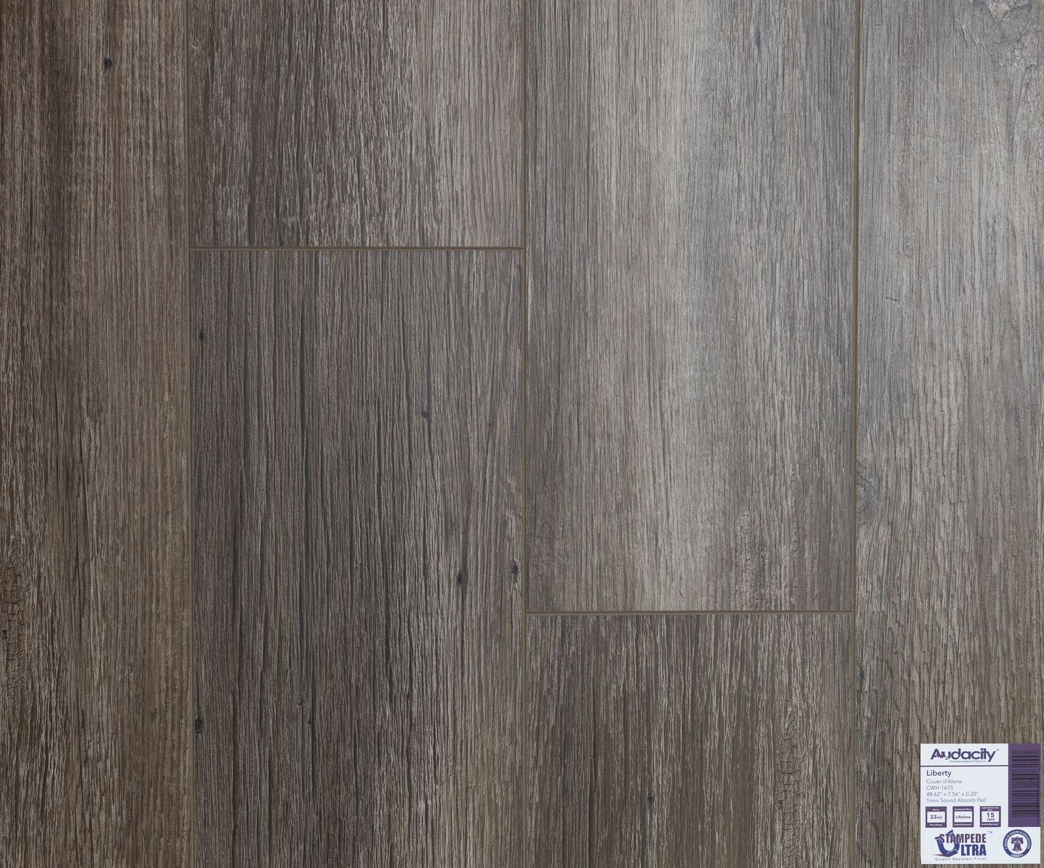 A close up of a wooden floor with a label on it.