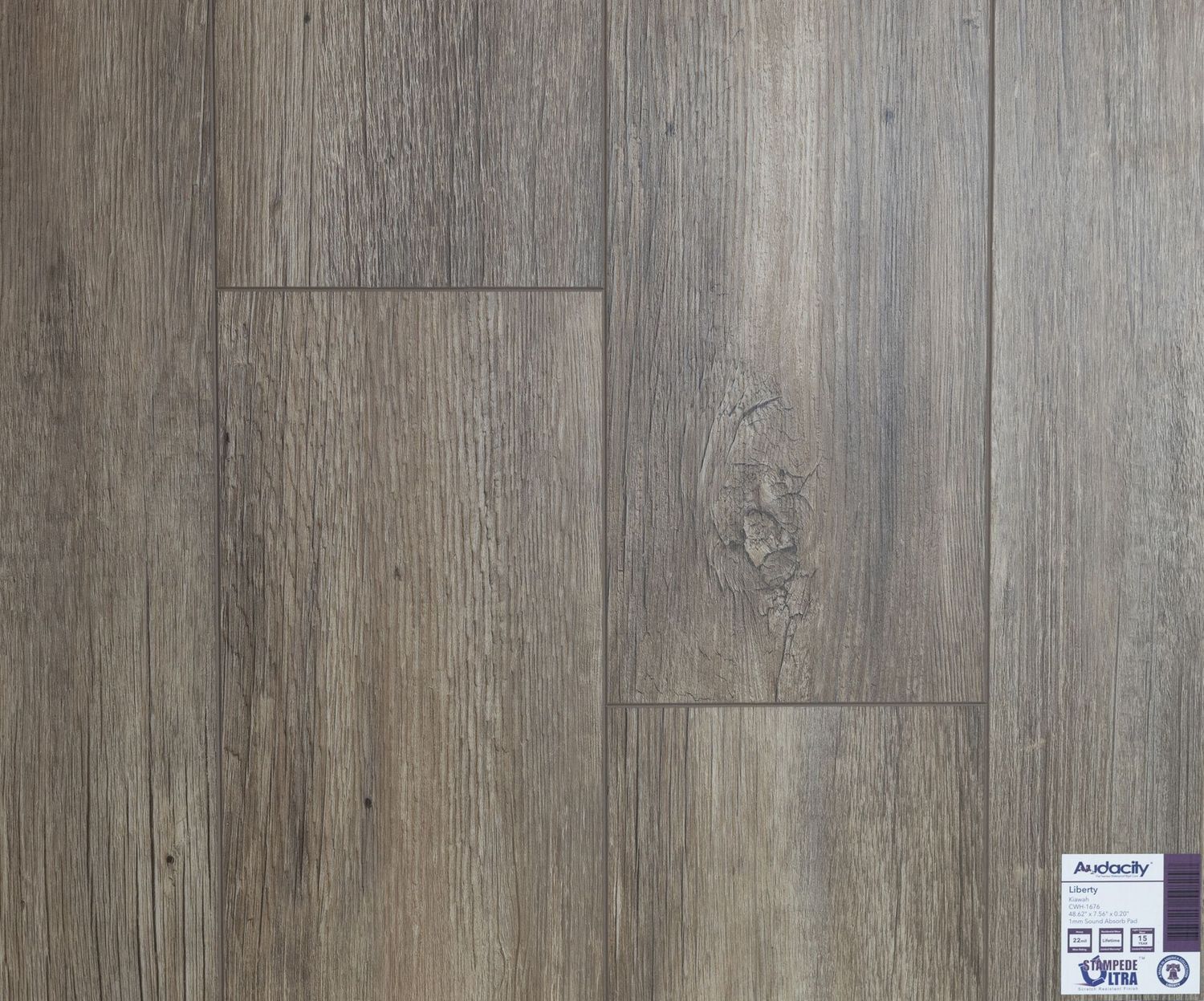 A close up of a wooden floor with a label on it.