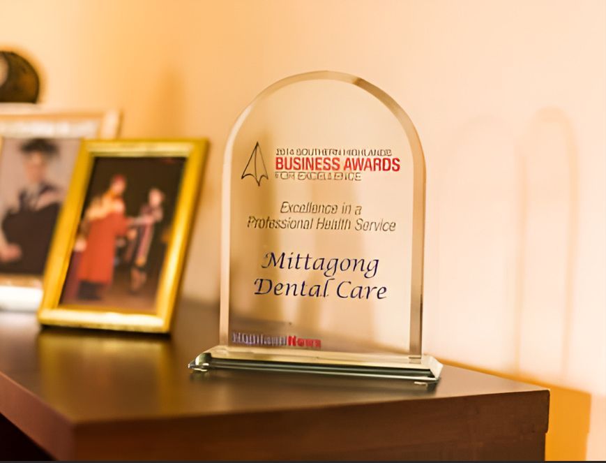 A Business Awards Plaque Sits On A Table — Mittagong Dental Care In Mittagong, NSW