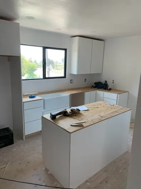 Bright kitchen renovation with open layout by Kearney Restorations
