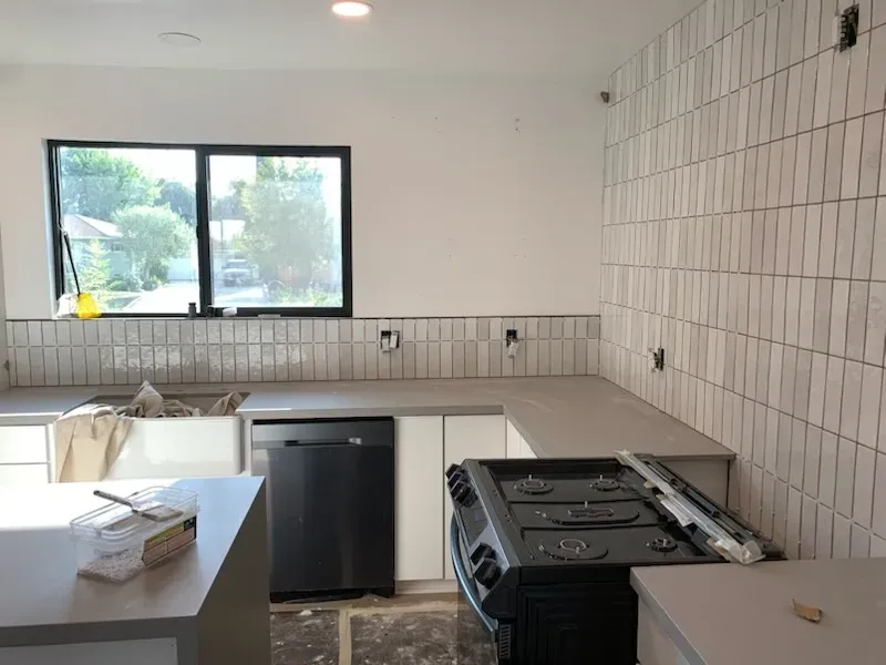 Updated kitchen with quartz countertops by Kearney Restorations Yucaipa CA