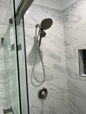 Bathroom upgrade with new vanity and fixtures by Kearney Restorations