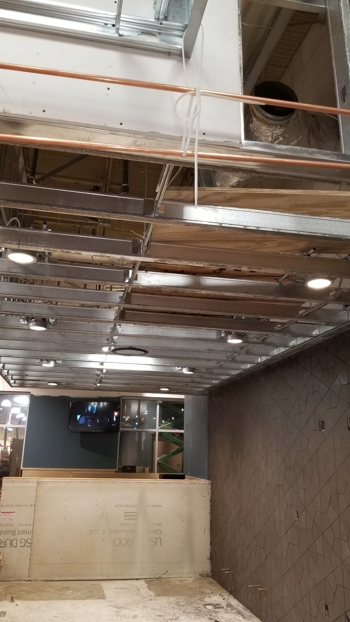 A room with a ceiling that is being remodeled