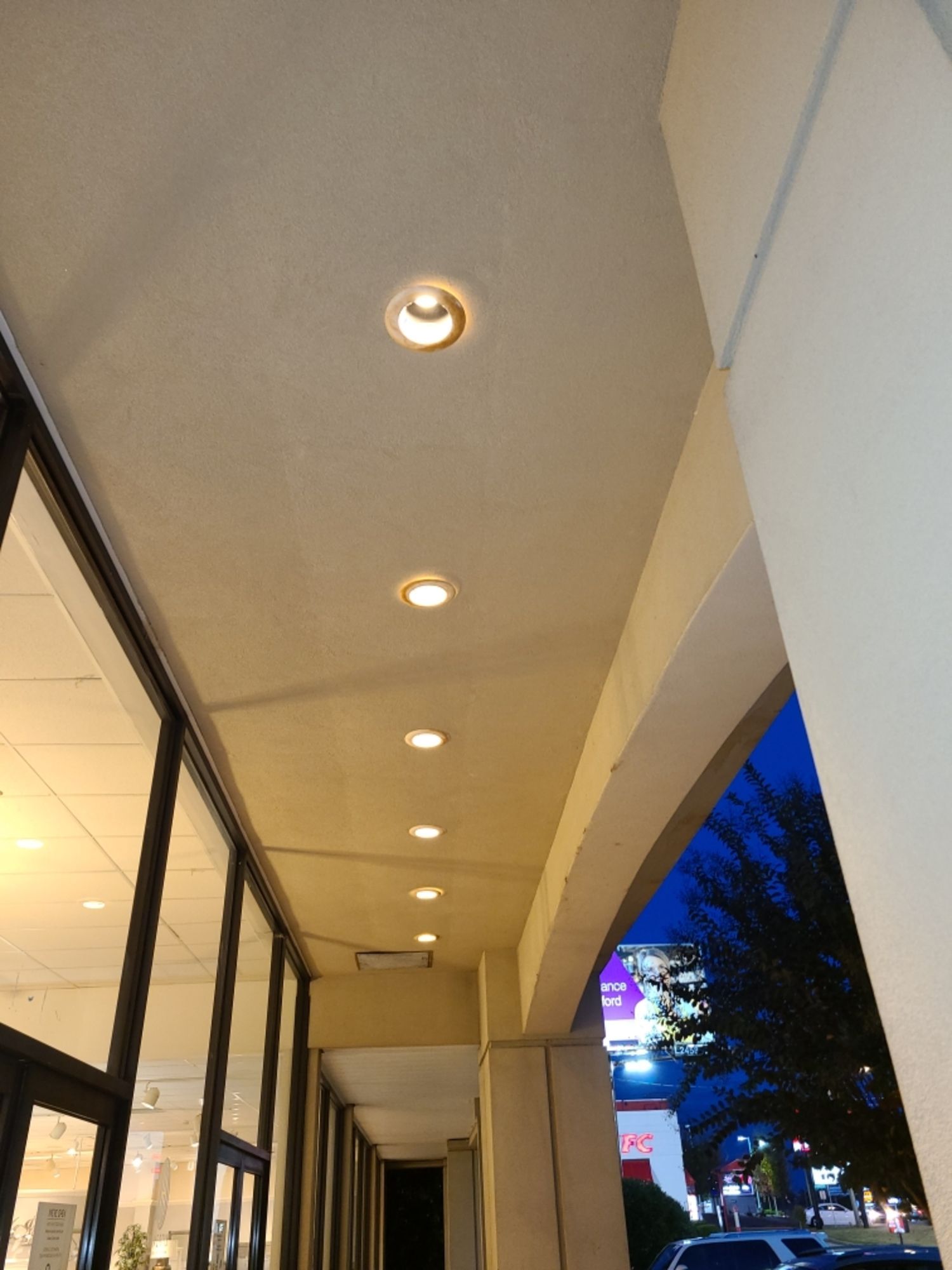 Looking up at the ceiling of a building at night