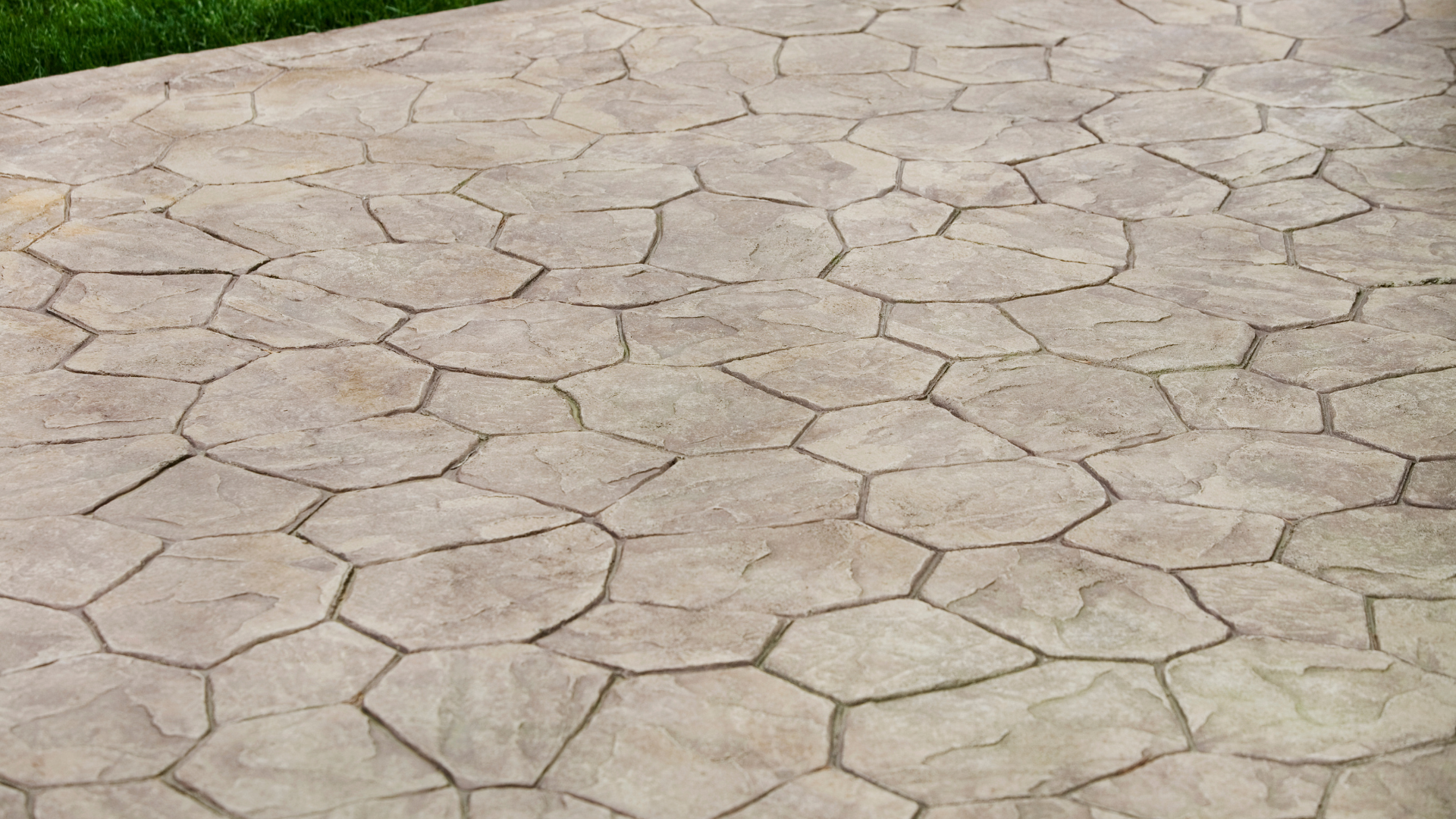 A concrete walkway with a hexagonal pattern on it.