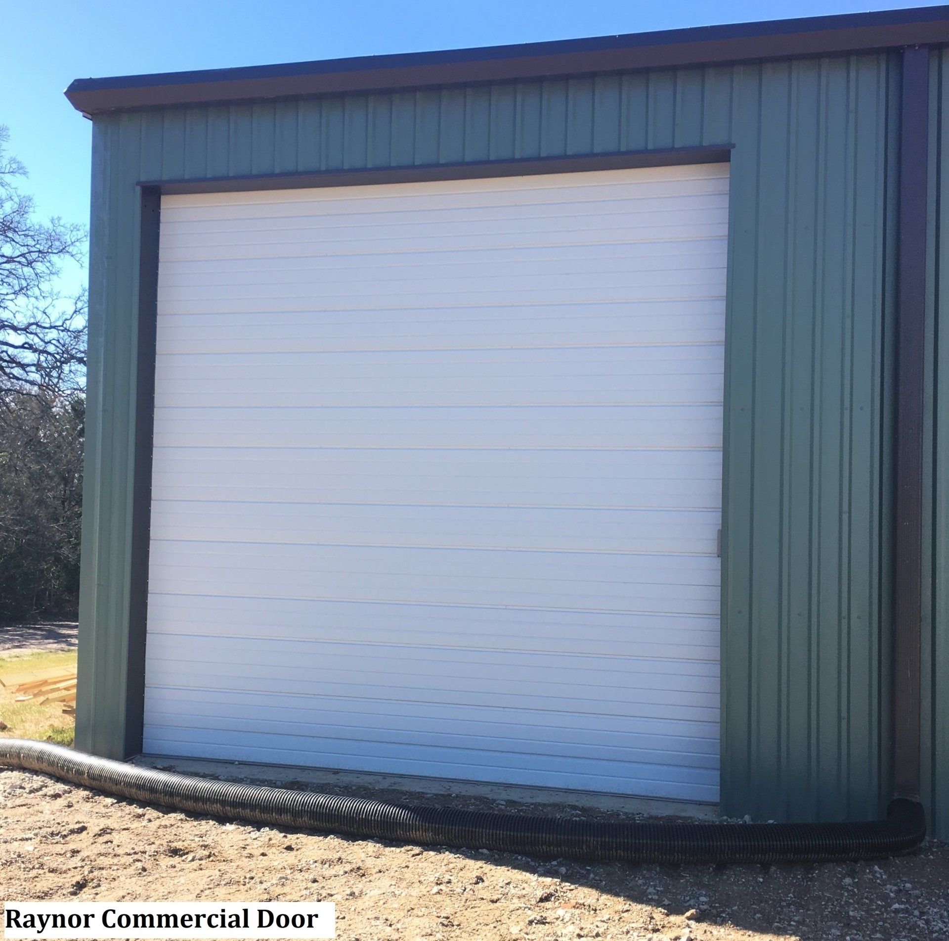 Garage Door Replacement - Commercial Raynor Door