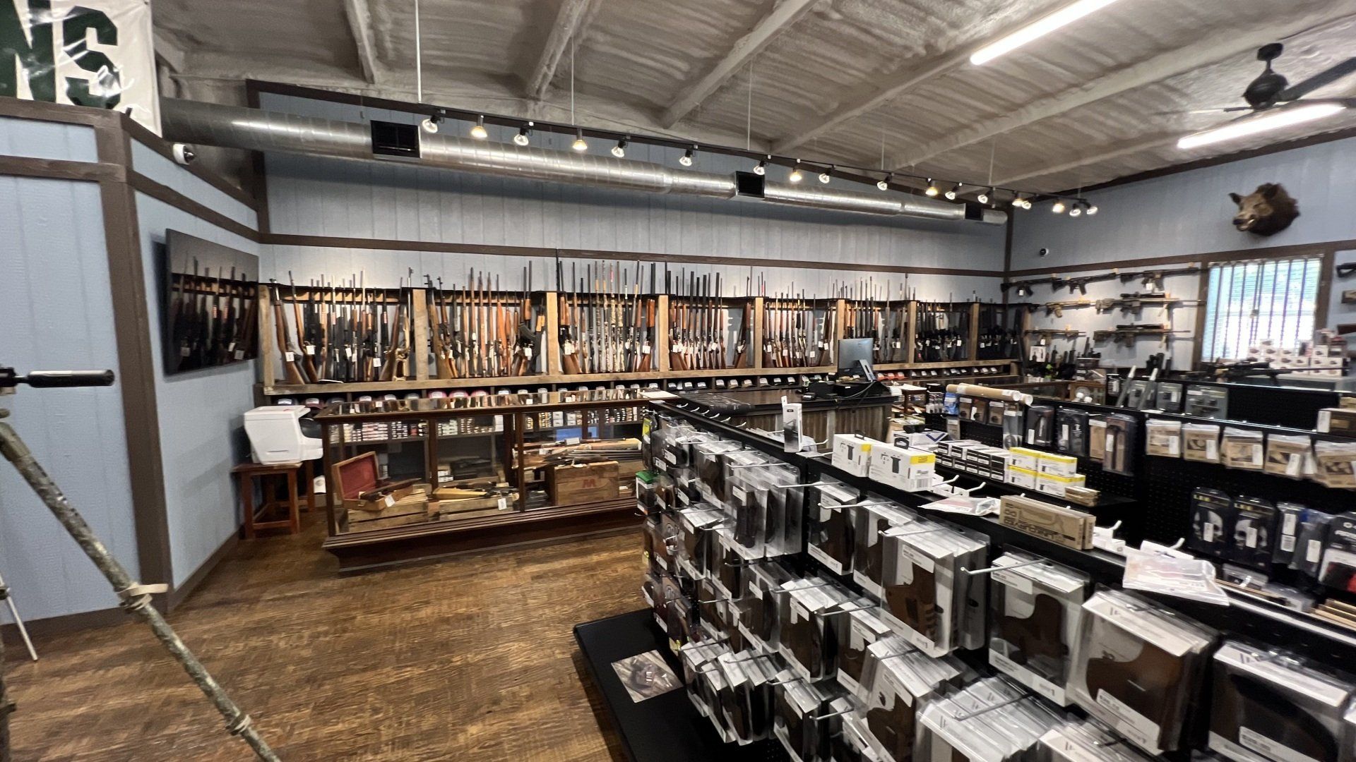 A large room filled with lots of shelves filled with lots of items.