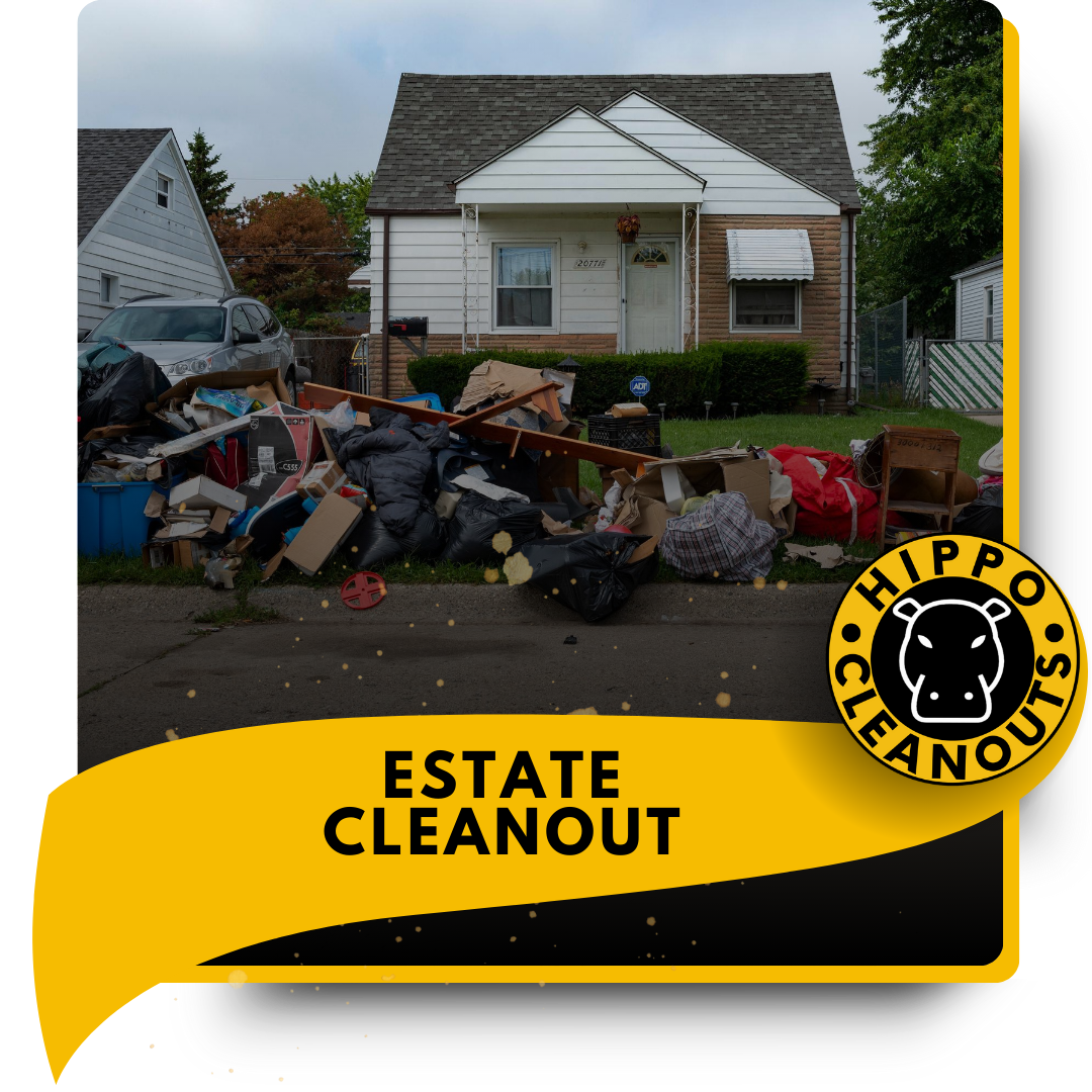 A pile of discarded materials in front of a house.