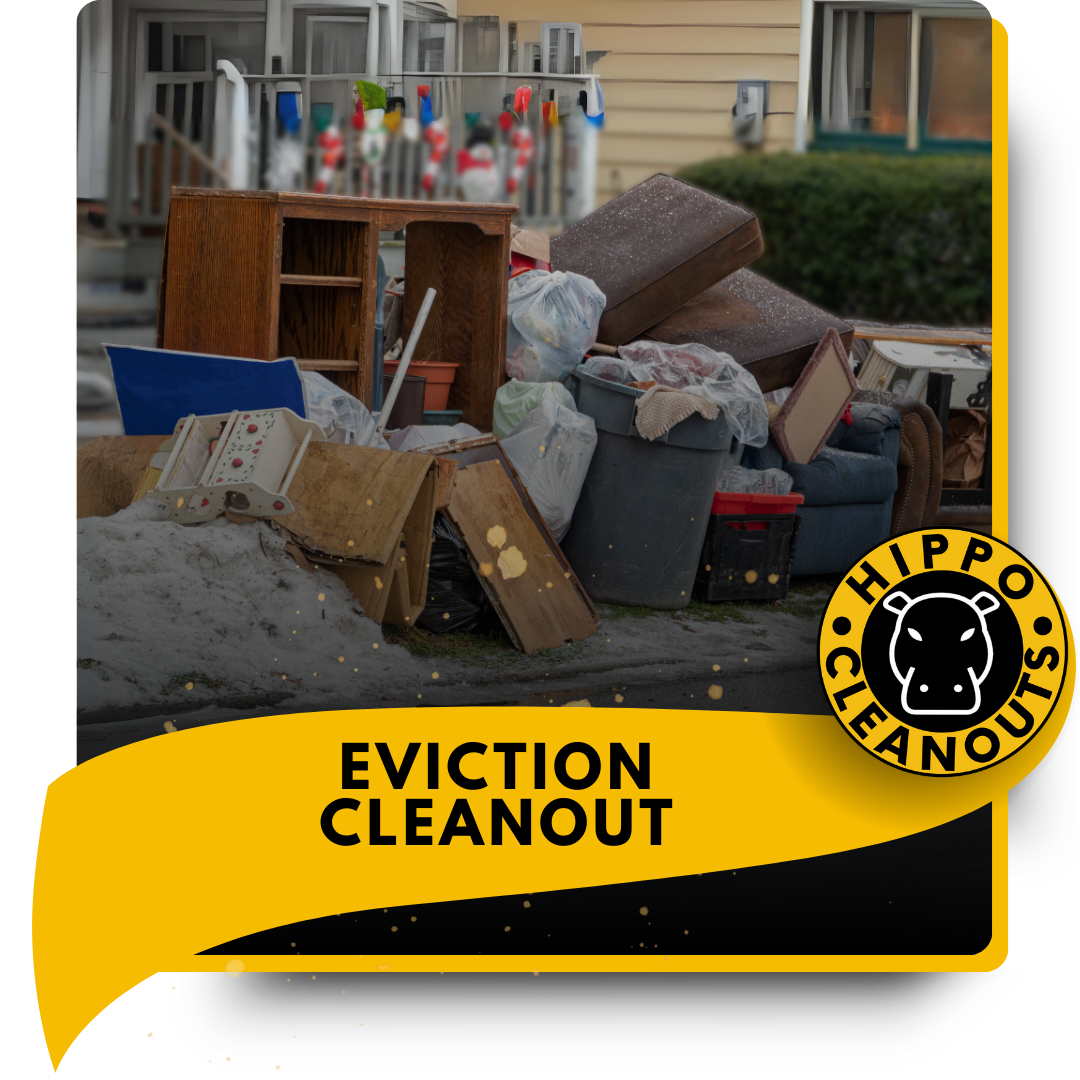 A pile of discarded materials in front of a house.
