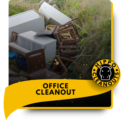 A discarded office furniture thrown in the grass.