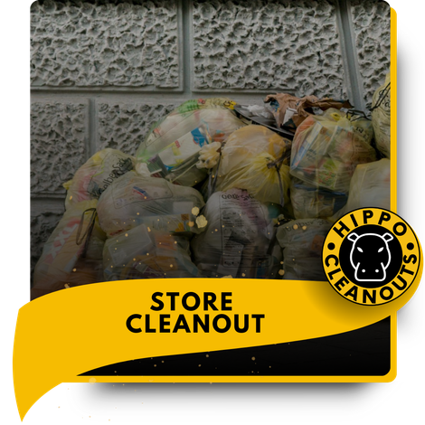 A pile of garbage in front of a store.
