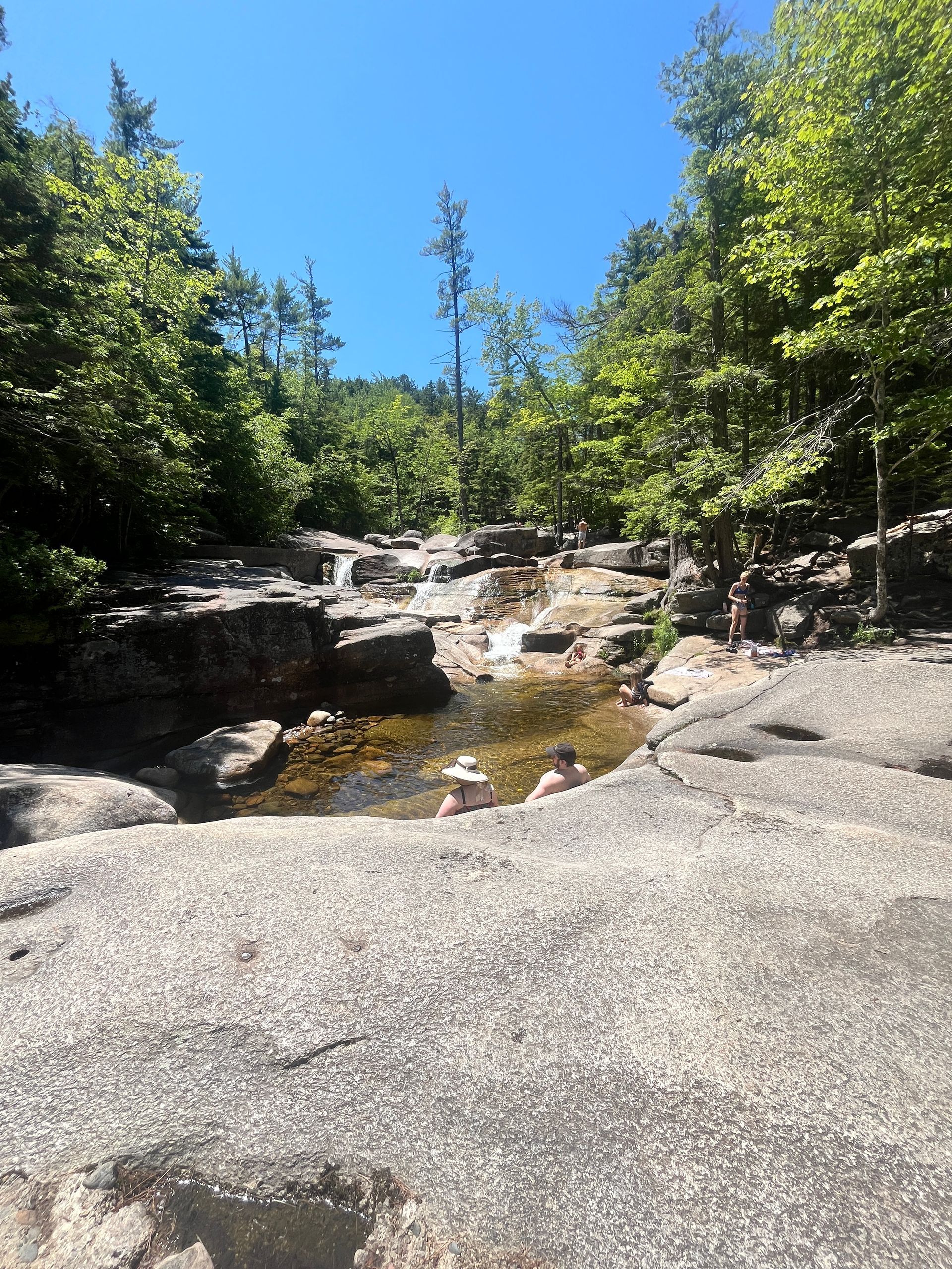A Day Trip to Diana’s Baths is a perfect summer hike from Cottage Place on Squam Lake where the hard
