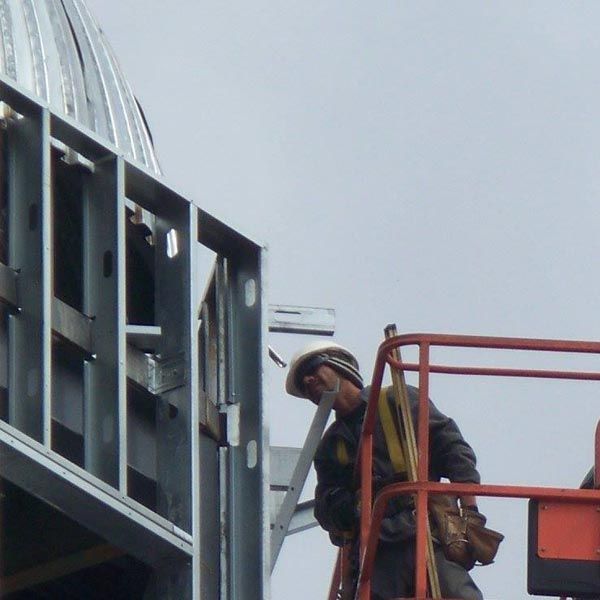 Man Checking the Metal Frame — Kings Mountain, NC — Coleman Contractors Inc