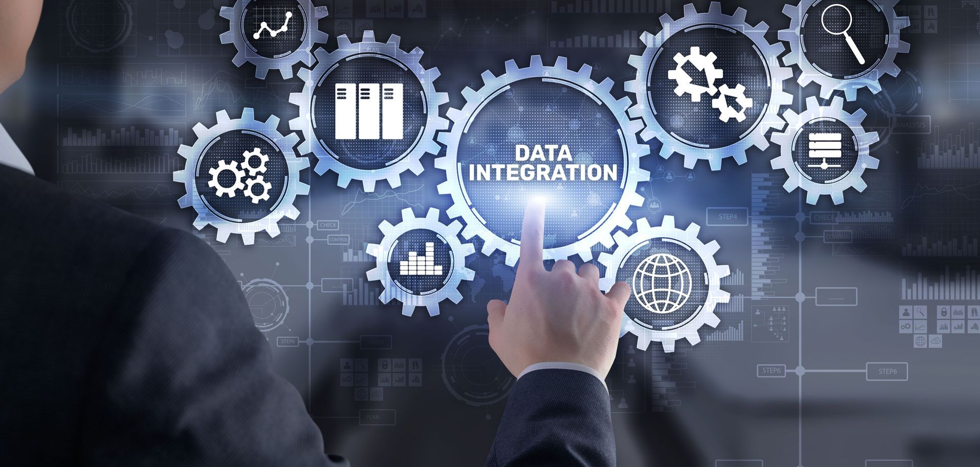 A Man is Pressing a Button on a Screen That Says Data Integration