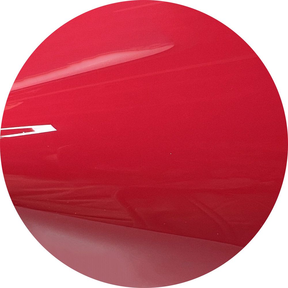 A close up of a red circle on a white background