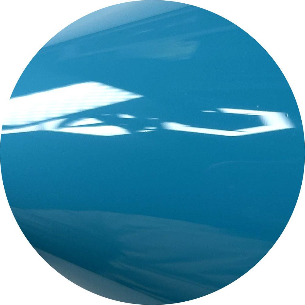 A close up of a blue circle with a white border