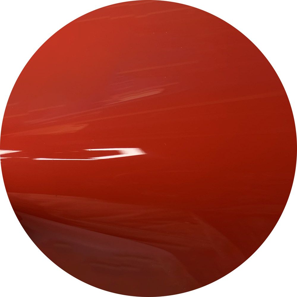 A close up of a red circle on a white background