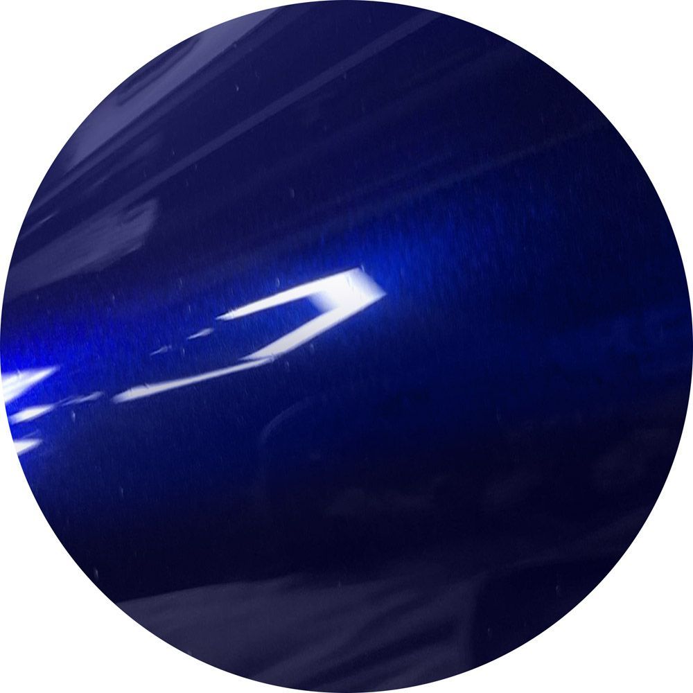 A close up of a blue circle with a white background