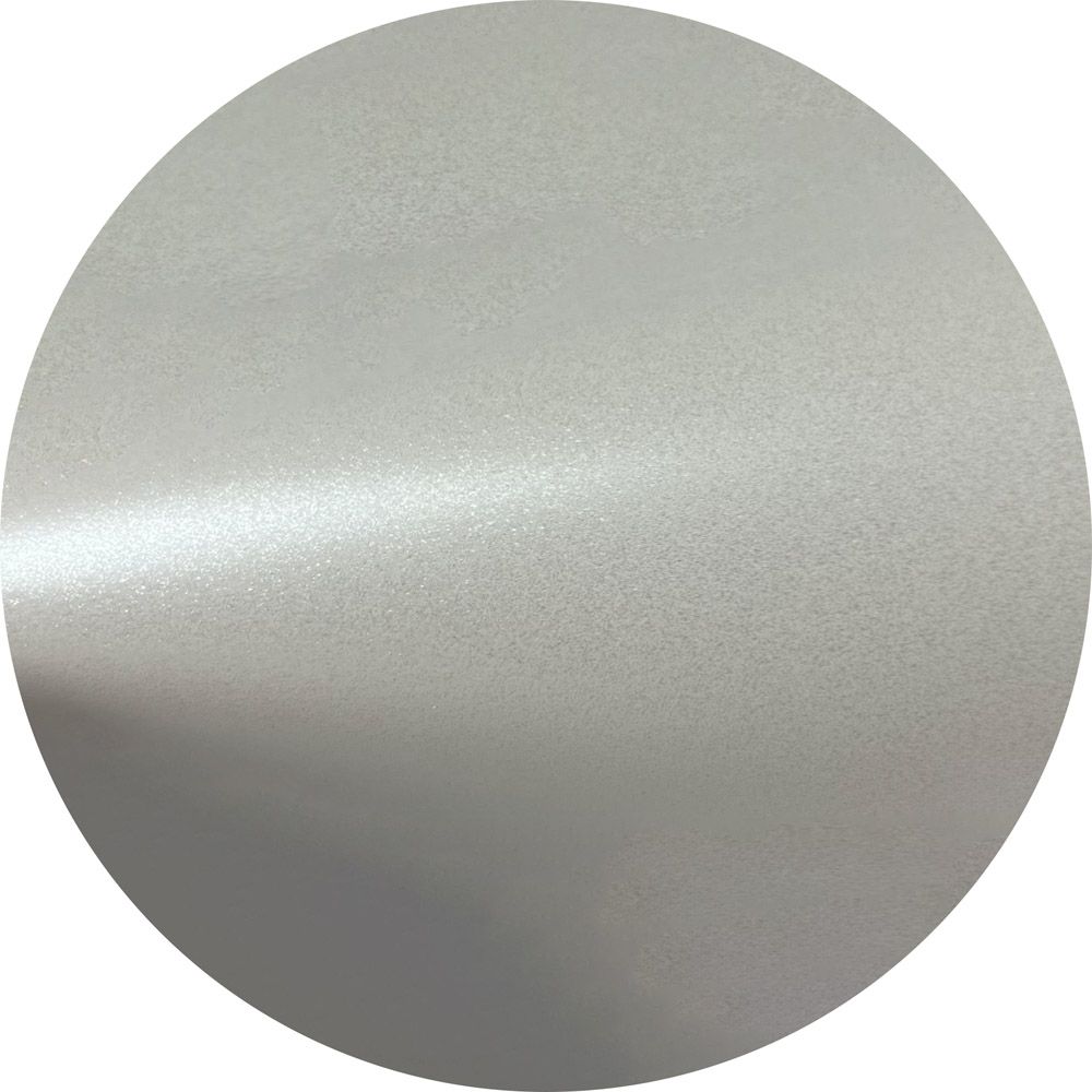 A close up of a white circle on a white background